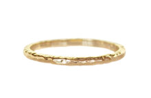 delicate thin gold wedding band