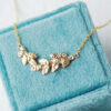 Hammered gold leaf necklace with diamonds