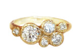 Custom gold ring with a cluster of diamonds created in Toronto
