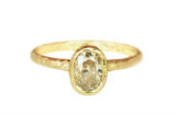 Alternative engagement ring with an oval champagne diamond, made in Canada