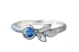 White gold ring with rustic blue sapphire