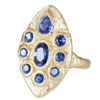 Textured gold empress ring with round and pear blue sapphires