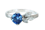 blue sapphire alternative engagement ring with gold leaves made in Canada