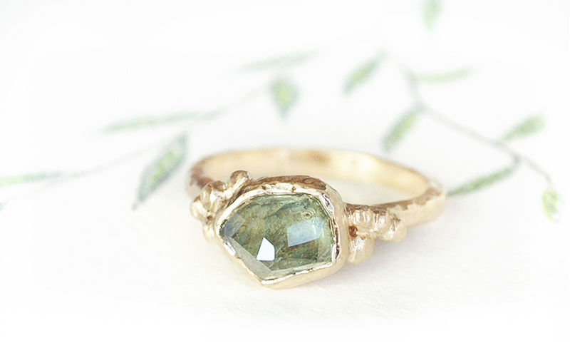 hammered gold ring with rough green sapphire, free form engagement ring made in Canada