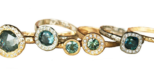 hammered gold rings with teal sapphires and diamond halos made in Canada