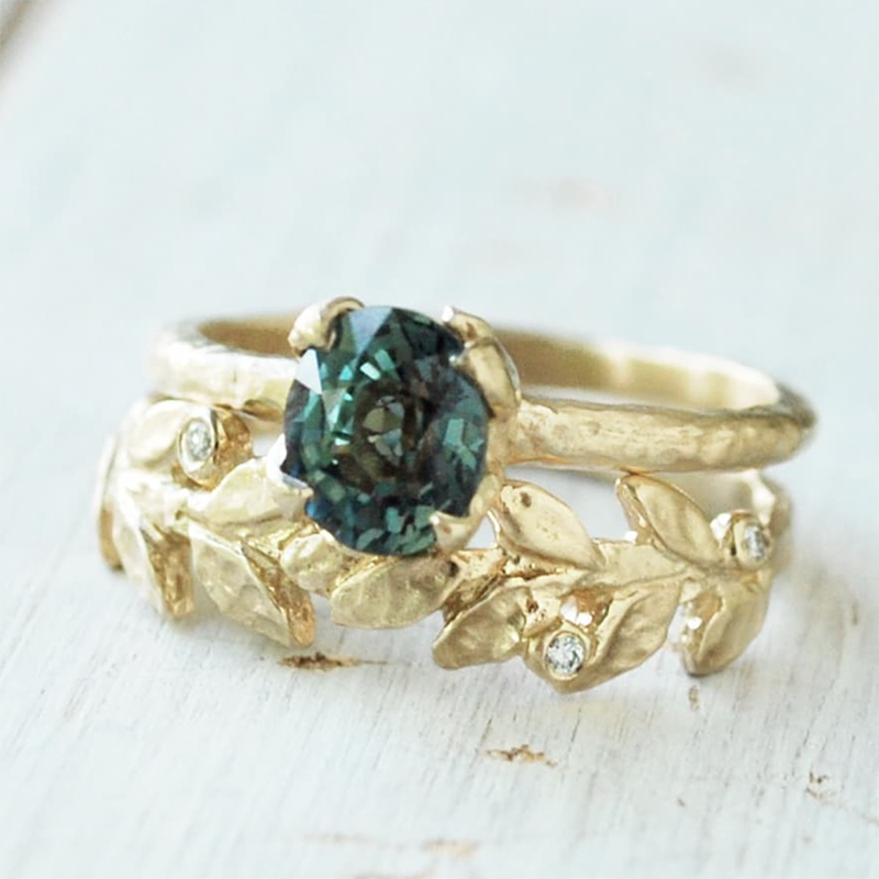 Teal sapphire alternative engagement ring with golden leaves wedding band with diamonds
