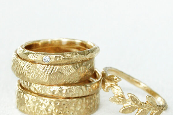 Textured wedding bands with hammered gold