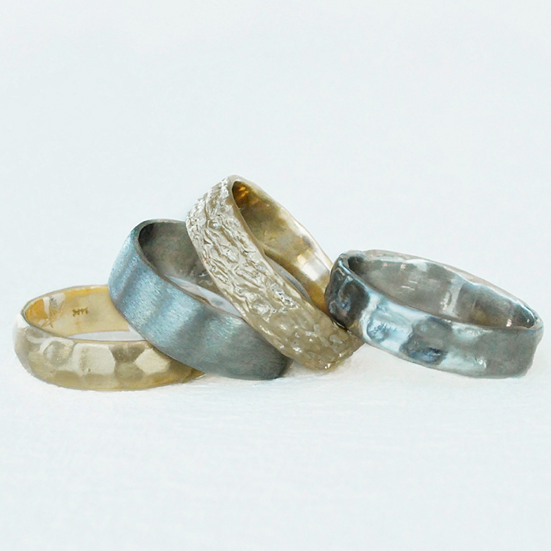White gold and yellow gold textured wedding bands