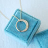 diamond moon crescent necklace in hammered gold