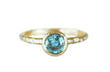 Teal sapphire ring with accent diamonds, hammered gold engagement ring