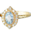 vintage light blue sapphire ring with a halo of diamonds