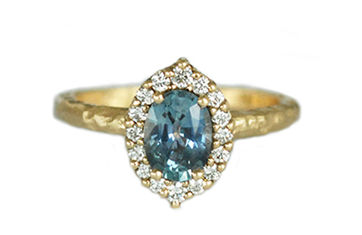 Oval teal Montana sapphire full carat ring with diamonds