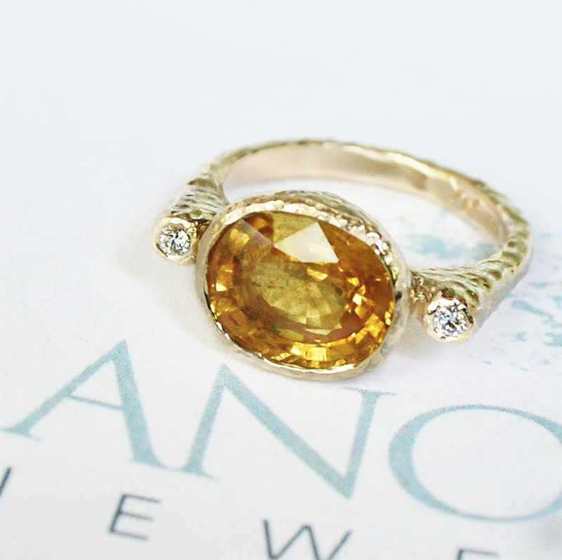 large yellow sapphire statement ring in hammered gold