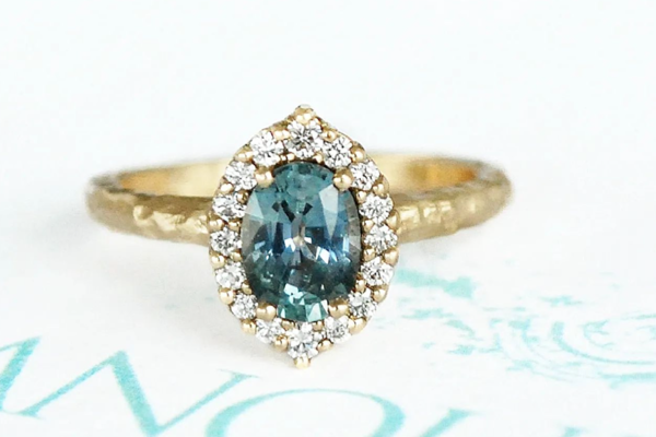 Teal Sapphire and diamond halo artisanal ring