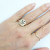 gold signet ring with diamonds on hand