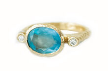 Water inspired aquamarine and diamonds statement ring in hammered gold