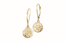 Hammered gold disc earrings made by hand in Toronto