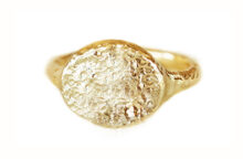 Oval signet ring in hammered gold