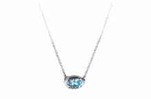 White gold necklace with oval aquamarine