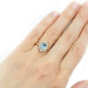 Light Blue rustic sapphire ring with diamonds, hammered gold and made by hand