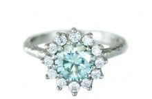 White gold vintage inspired ring with a teal moissanite and accent moissanites