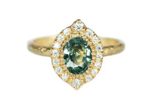Green oval sapphire and diamonds ring