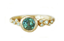 rustic green sapphire and ten diamonds textured gold ring