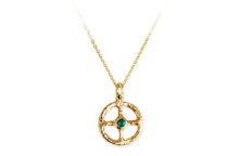 Textured gold Medicine Wheel pendant with round emerald