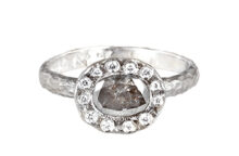 Palladium ring with an oval grey rose cut diamond and a halo of diamonds
