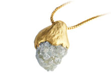 rough 9 carat diamond set in textured 18k gold pendant