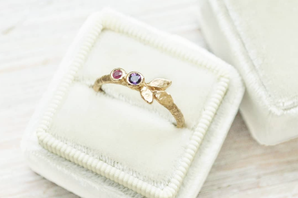 custom family ring with ruby and amethyst and hammered gold leaf