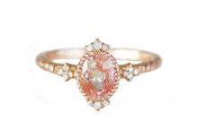 Rose gold ring with peach sapphire and diamonds