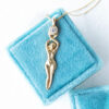 Lighworker priestess gold and diamond necklace in a jewelry box