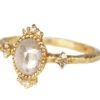 Oval diamond dainty vintage style ring with tiny diamonds, side view