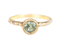green sapphire ring with diamonds