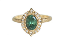 Oval alexandrite and diamond halo ring