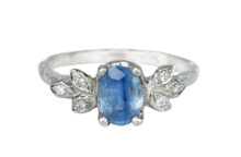 White gold ring with rustic blue sapphire and diamonds