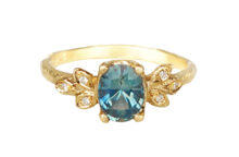 Blue-green oval sapphire ring with diamonds