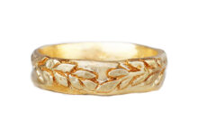 Organic texture wedding band with sculpted golden wreath relief, non-traditional