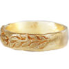 non-traditional Organic texture wedding band with sculpted golden leaves wreath relief