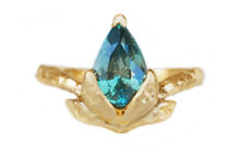 large green pear sapphire ring with golden leaves