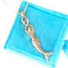 Textured gold mermaid necklace with aquamarine in a vintage box