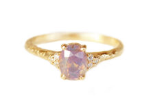 opalescent lilac sapphire ring with diamond accents