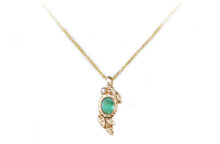 oval emerald and diamond gold necklace with leaves