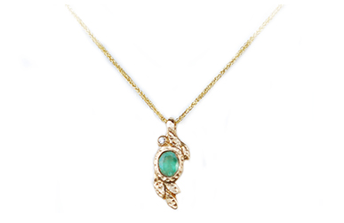 oval emerald and diamond gold necklace with leaves