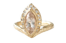 Marquise peach champagne sapphire gold ring with a halo of diamonds