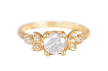 Sculpted gold Engagement ring with icy diamond and six accent diamonds