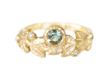 golden leaves sculpted wreath with green sapphire and accent diamonds ring