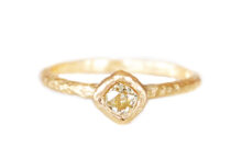 old mine cut light yellow diamond ring in textured gold