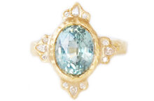 oval teal sapphire and diamond halo sculpted gold ring